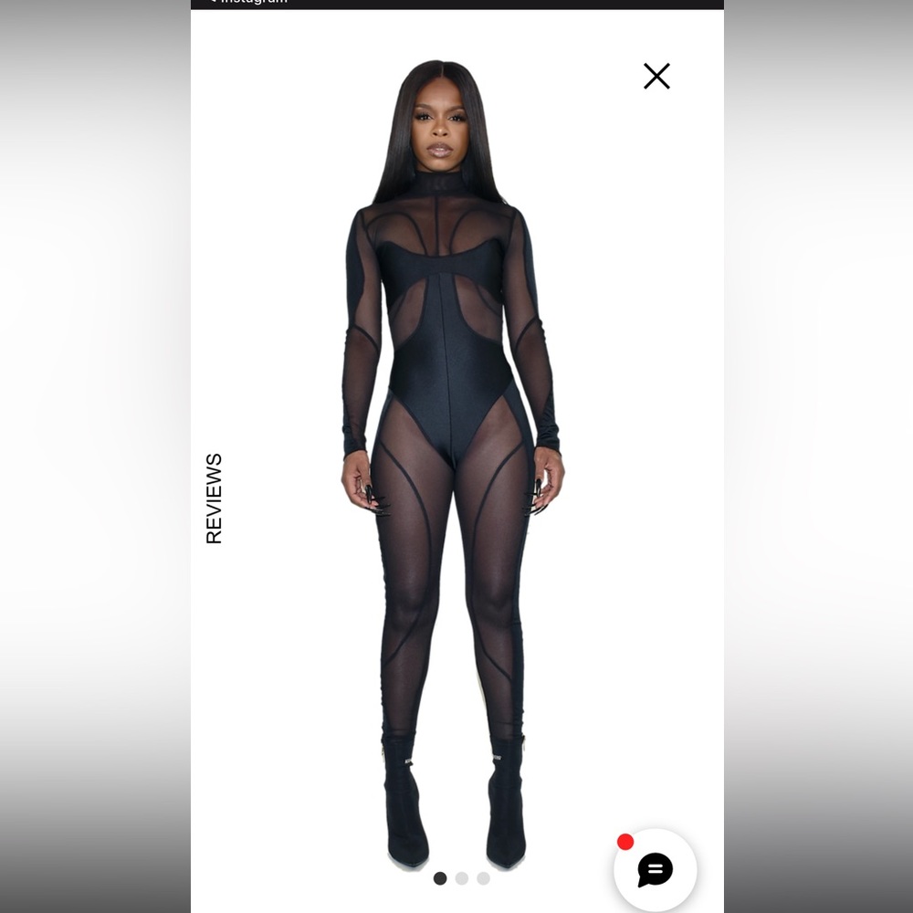 Black Jumpsuit for sell too big, only tried on once.